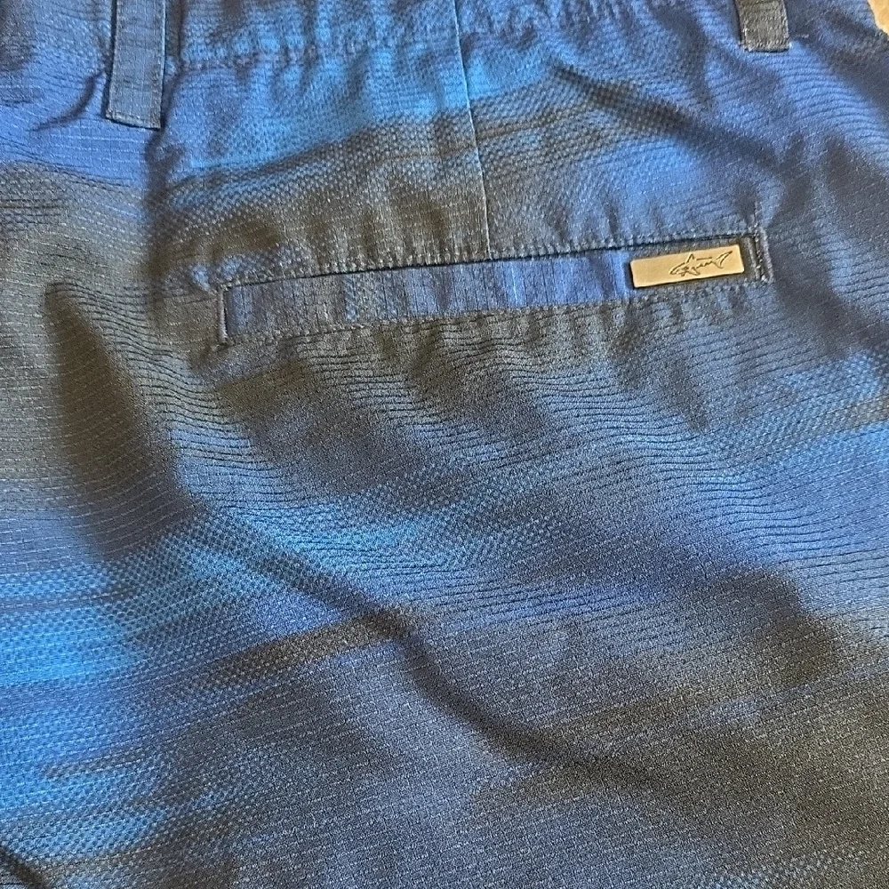 (J47) Greg Norman Mens Blue Swim Shorts Sz 34